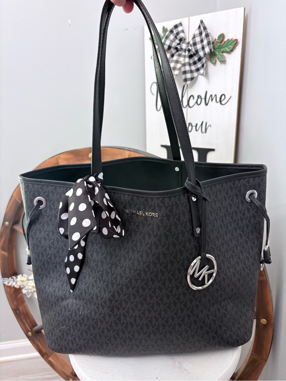 Michael Kors Jet Set Travel Drawstring Tote in black signature MK PVC 🖤